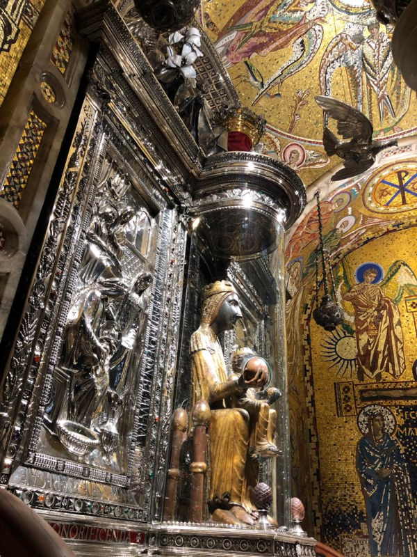 Statue of the Black Madonna inside Montserrat Basilica, a revered spiritual symbol of Catalonia