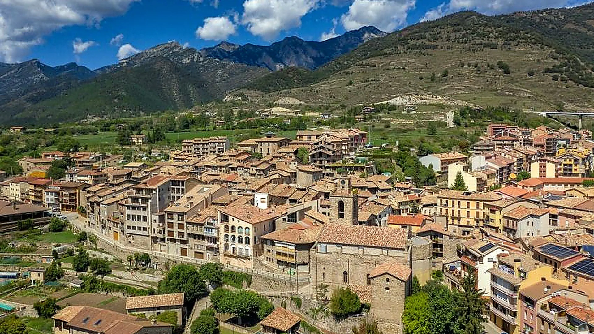 View of Bagà village in Catalonia surrounded by mountains